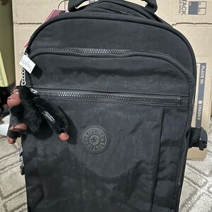 Kipling Black rolling backpack with handle